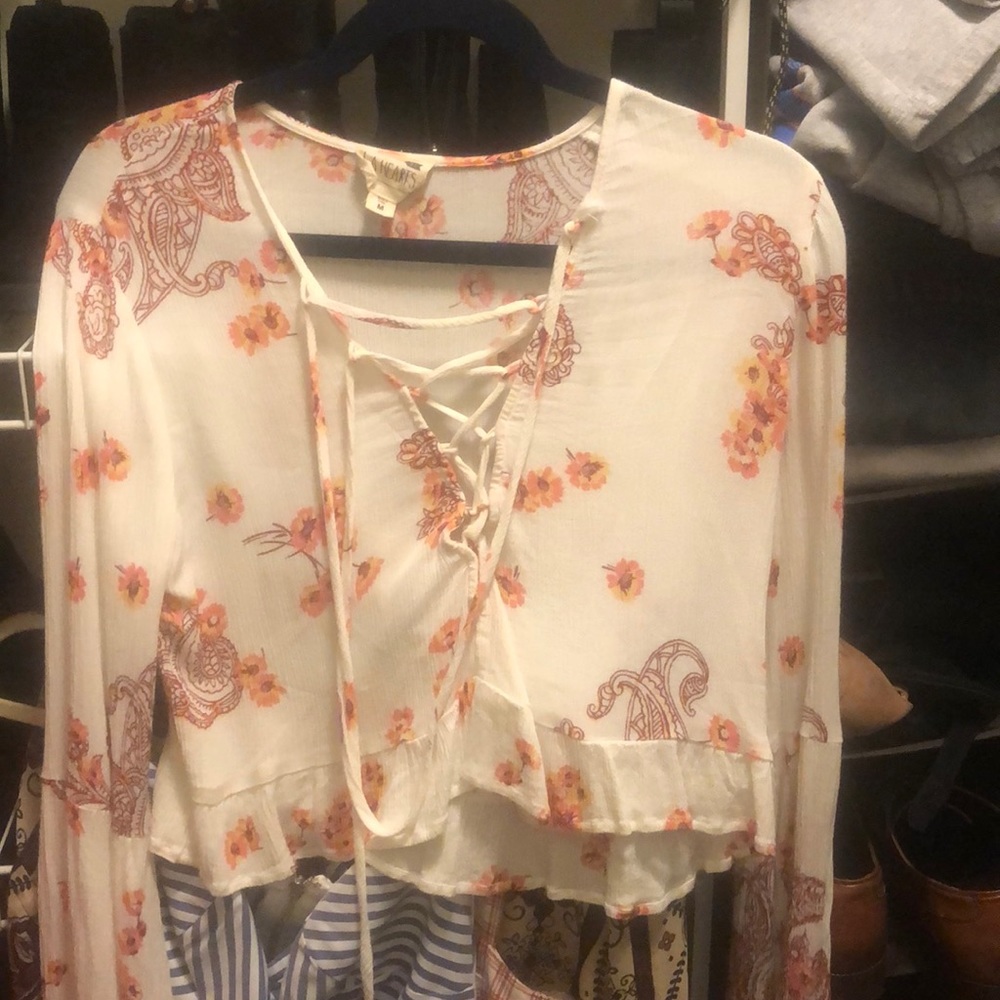 Lace up floral bell sleeve top
